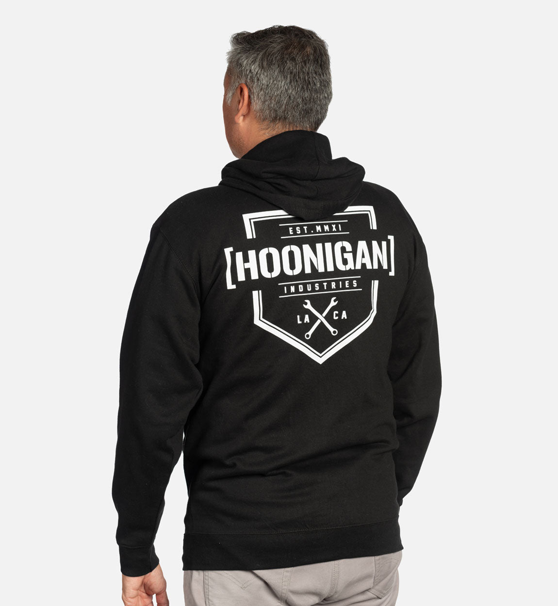 Hoonigan BRACKET X LOGO Zip Hoodie featuring a bold logo design on a black fabric background.