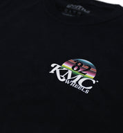 KMC DAY ONE Short Sleeve Tee in black featuring bold white graphics on the front.