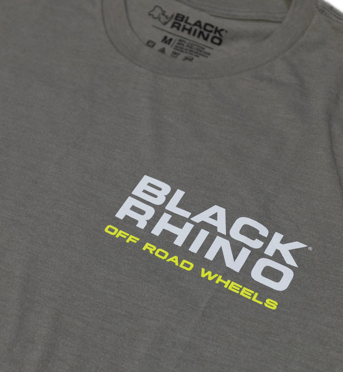 Black Rhino SUMMIT Short Sleeve Tee in black with a minimalist design and logo on the chest, showcased on a plain background.