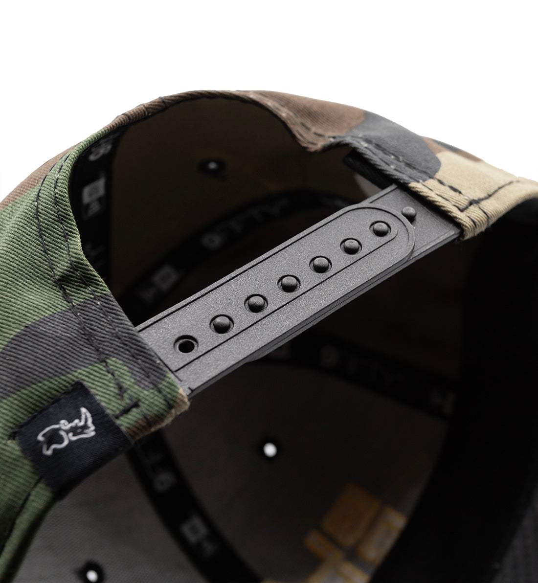 Black Rhino STACKED Snapback Hat in black with a bold logo design, featuring an adjustable fit and a flat brim.