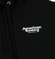 American Racing logo hoodie featuring a bold graphic design in black and red on a gray background.