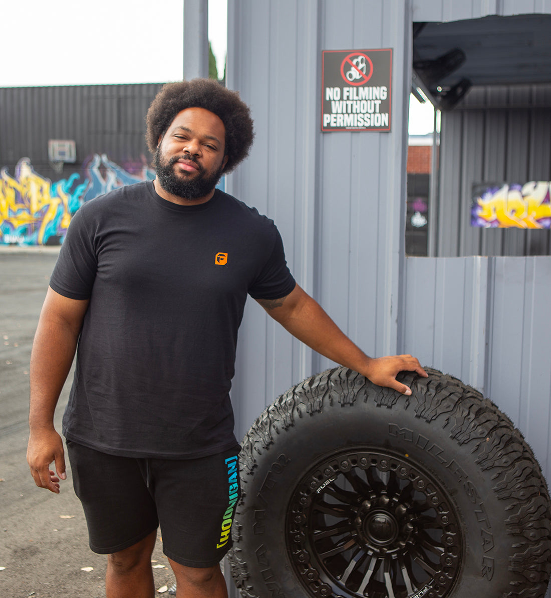 Gray Fuel HAZARD Short Sleeve Tee displayed on a model, featuring bold graphics and a casual fit.