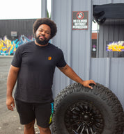 Gray Fuel HAZARD Short Sleeve Tee displayed on a model, featuring bold graphics and a casual fit.