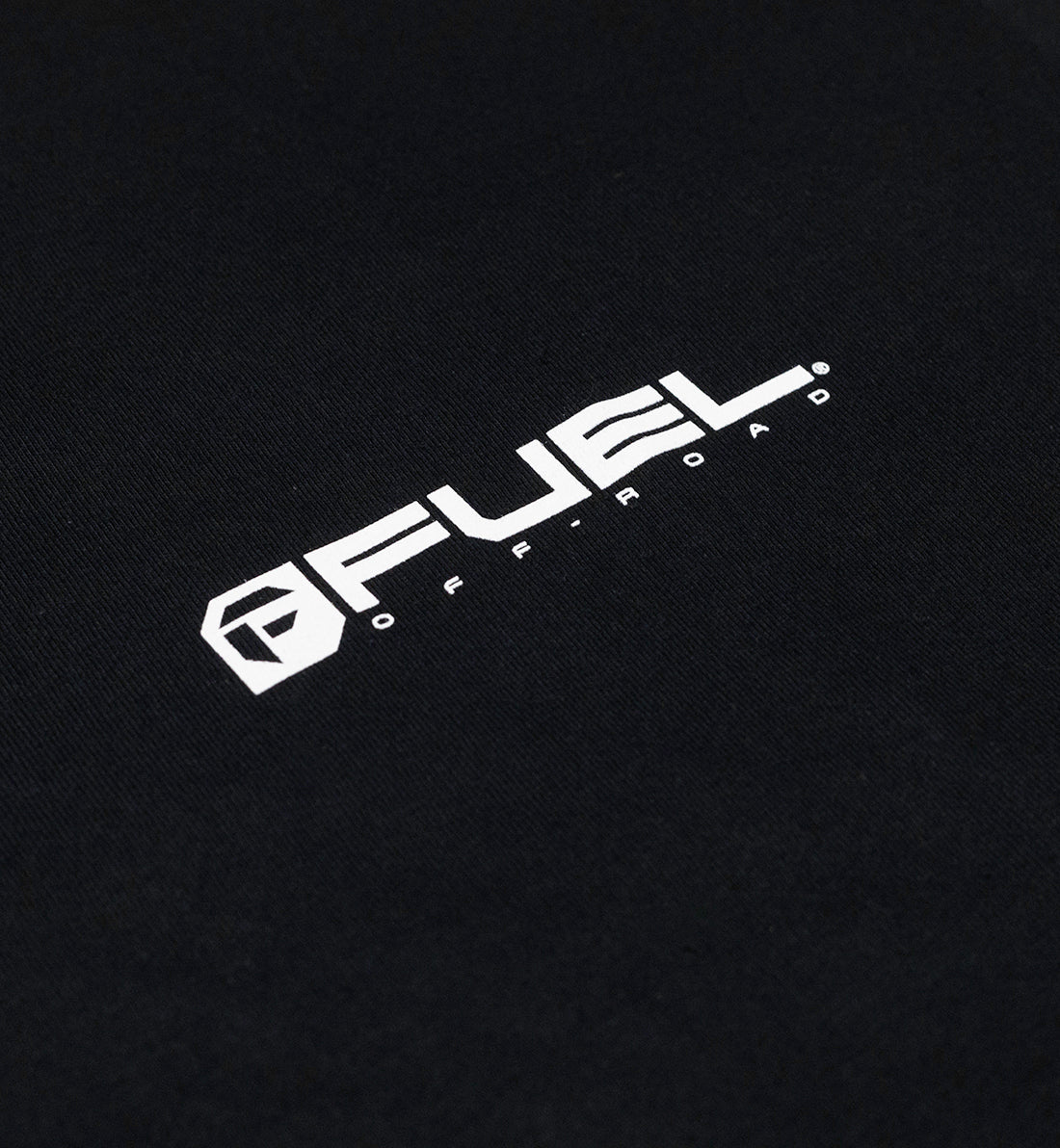 "Fuel MALL CRAWL Short Sleeve Tee in dark green with a graphic design featuring a vintage truck and outdoor elements."