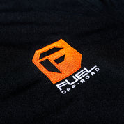 Fuel Sport Polo in navy blue with a modern design, featuring a collar and short sleeves.