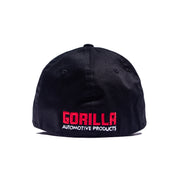 Black Gorilla Automotive FLEXFIT hat with red embroidered "GORILLA" and white "AUTOMOTIVE PRODUCTS" text on the front.