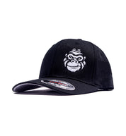 Black Gorilla Automotive FLEXFIT hat with a white embroidered gorilla face logo on the front.