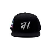 Hoonigan H LEAGUE Snapback Hat in black with embroidered logo on the front.