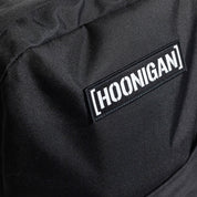 Hoonigan CENSOR BAR Light Backpack in black, featuring a graphic design and adjustable straps.