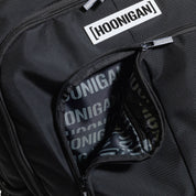 Hoonigan METAL BAR Backpack featuring a black exterior with a bold logo and adjustable straps.