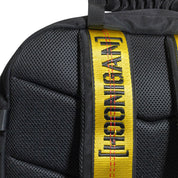 Hoonigan RATCHET STRAP Backpack featuring a bold design with adjustable ratchet straps, multiple compartments, and a durable fabric.