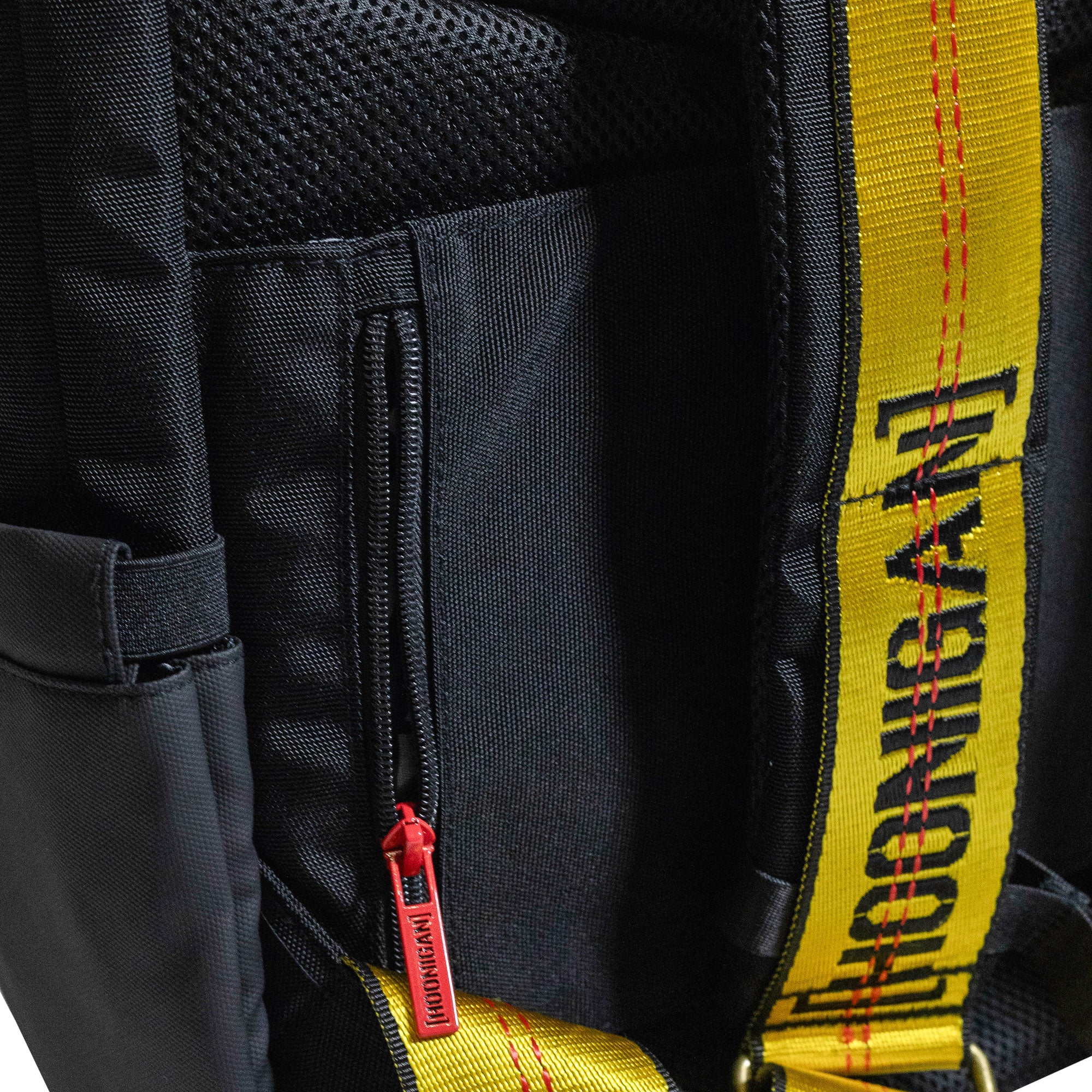 Hoonigan RATCHET STRAP Backpack featuring a black design with bold logo and adjustable straps.