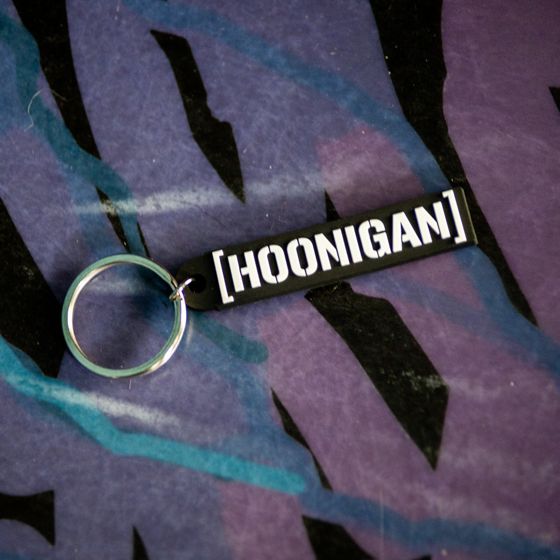 Hoonigan CENSOR BAR Rubber Keychain featuring a bold, black and white design, showcasing the Hoonigan logo and aesthetic.