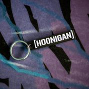 Hoonigan CENSOR BAR Rubber Keychain featuring a bold, black and white design, showcasing the Hoonigan logo and aesthetic.