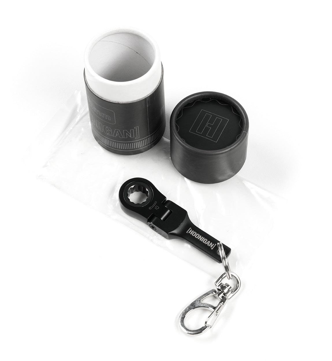 Hoonigan FOUND IT Keychain featuring a durable design with a bottle opener and keyring attachment for automotive enthusiasts.