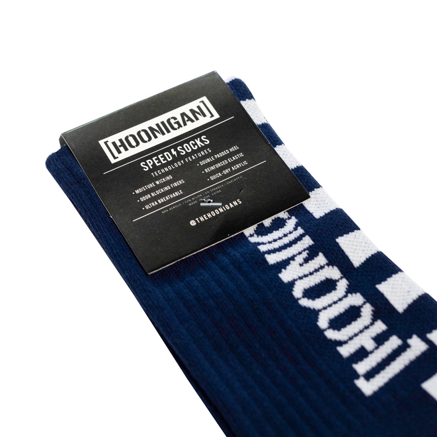 Hoonigan FINISHLINE II Crew Socks featuring a black and white design with "Hoonigan" logo and racing stripes.