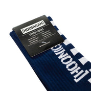 Hoonigan FINISHLINE II Crew Socks featuring a black and white design with "Hoonigan" logo and racing stripes.