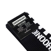 Hoonigan FINISHLINE II Crew Socks featuring a bold black and white design with logo and graphic patterns.