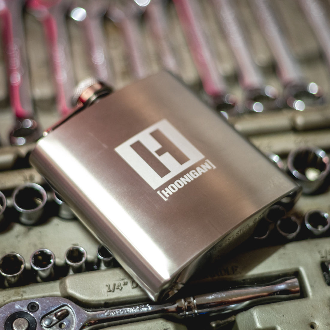 Hoonigan H BOX 6oz stainless steel flask with black finish and Hoonigan logo.