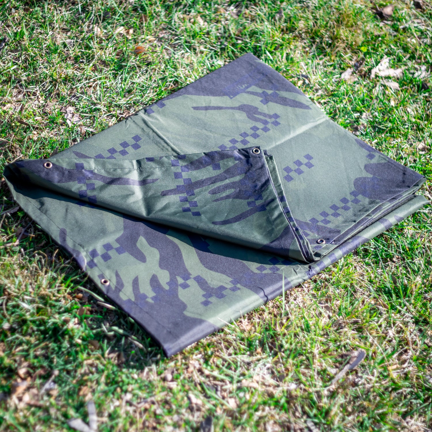 Hoonigan DISTRUPTIVE Nylon Tarp in vibrant design, showcasing durable nylon material and reinforced edges, ideal for outdoor use.