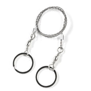 Silver and black safety kit with a braided lanyard and circular rings, designed for use with the Hoonigan OH SH*T Safety Kit.