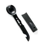 Black safety spoon with a serrated edge and a black foam handle, part of the Hoonigan OH SH*T Safety Kit for emergency use.