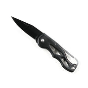Black folding knife with a partially serrated blade and a black handle, part of the Hoonigan OH SH*T Safety Kit.