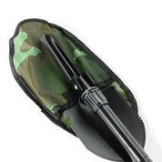 Black shovel with a camouflage fabric cover, part of the Hoonigan OH SH*T Safety Kit, designed for emergency use.
