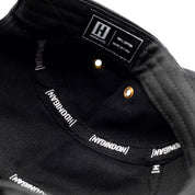 Hoonigan SURGEON GENERAL Camper Hat featuring a camouflage design and embroidered logo on the front.