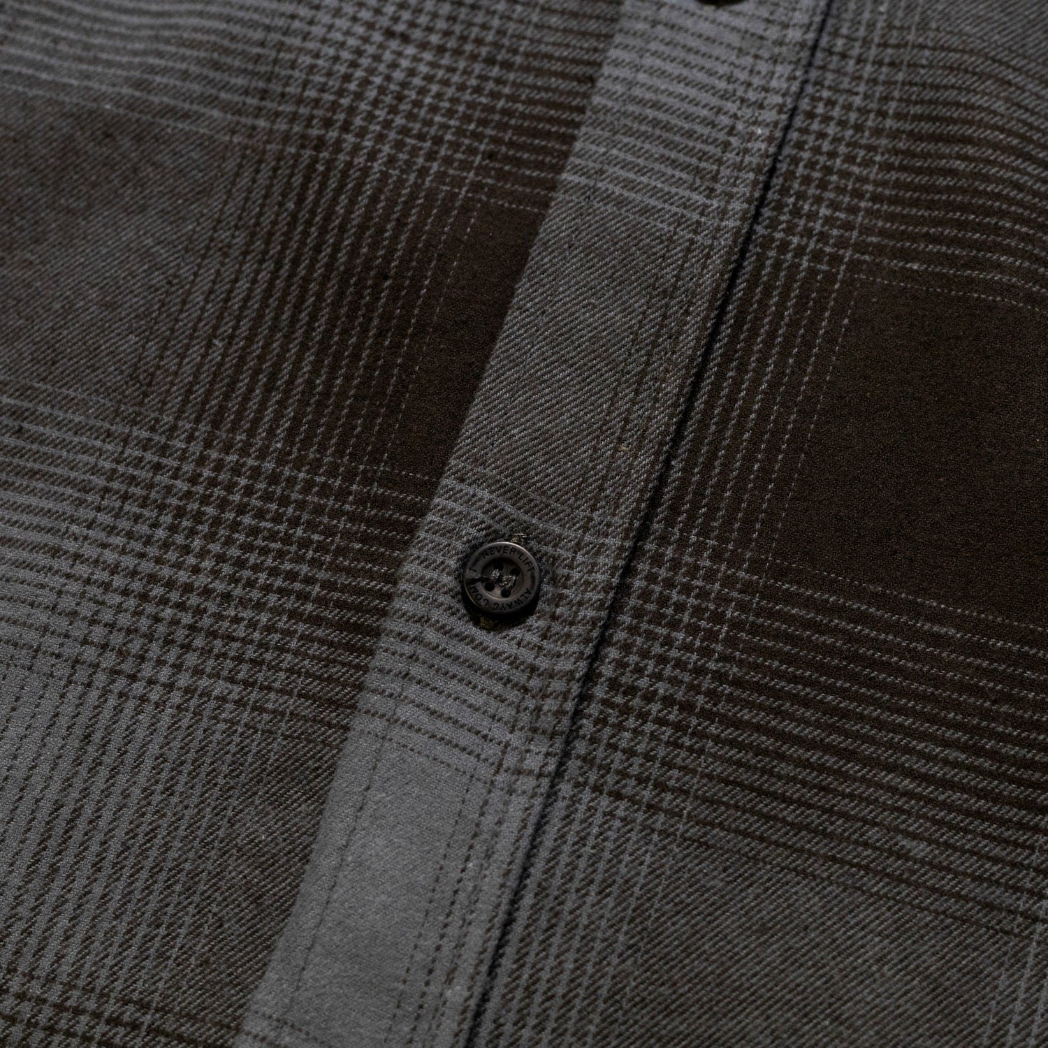 Hoonigan RUST Long Sleeve Flannel Shirt in orange and gray plaid pattern, featuring a button-up front and a casual fit.