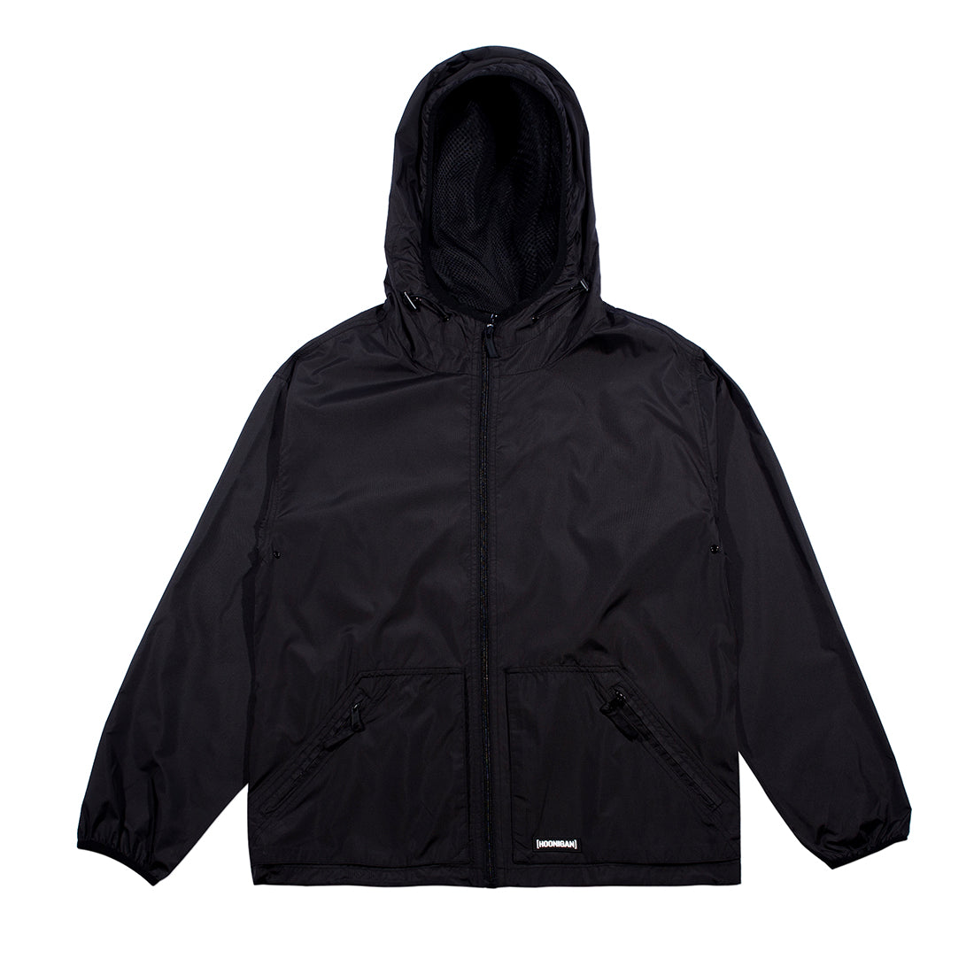 Hoonigan STANDARD ISSUE Windbreaker Jacket in black and white, featuring a bold logo on the front, zip closure, and adjustable hood.