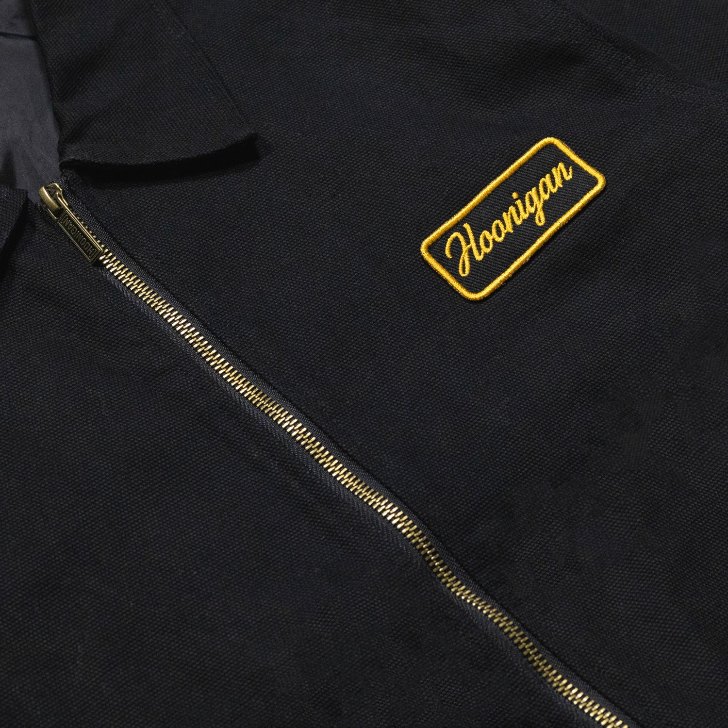 Hoonigan KNUCKLEBUSTERS black bomber jacket with embroidered logo and unique graphic design on back.