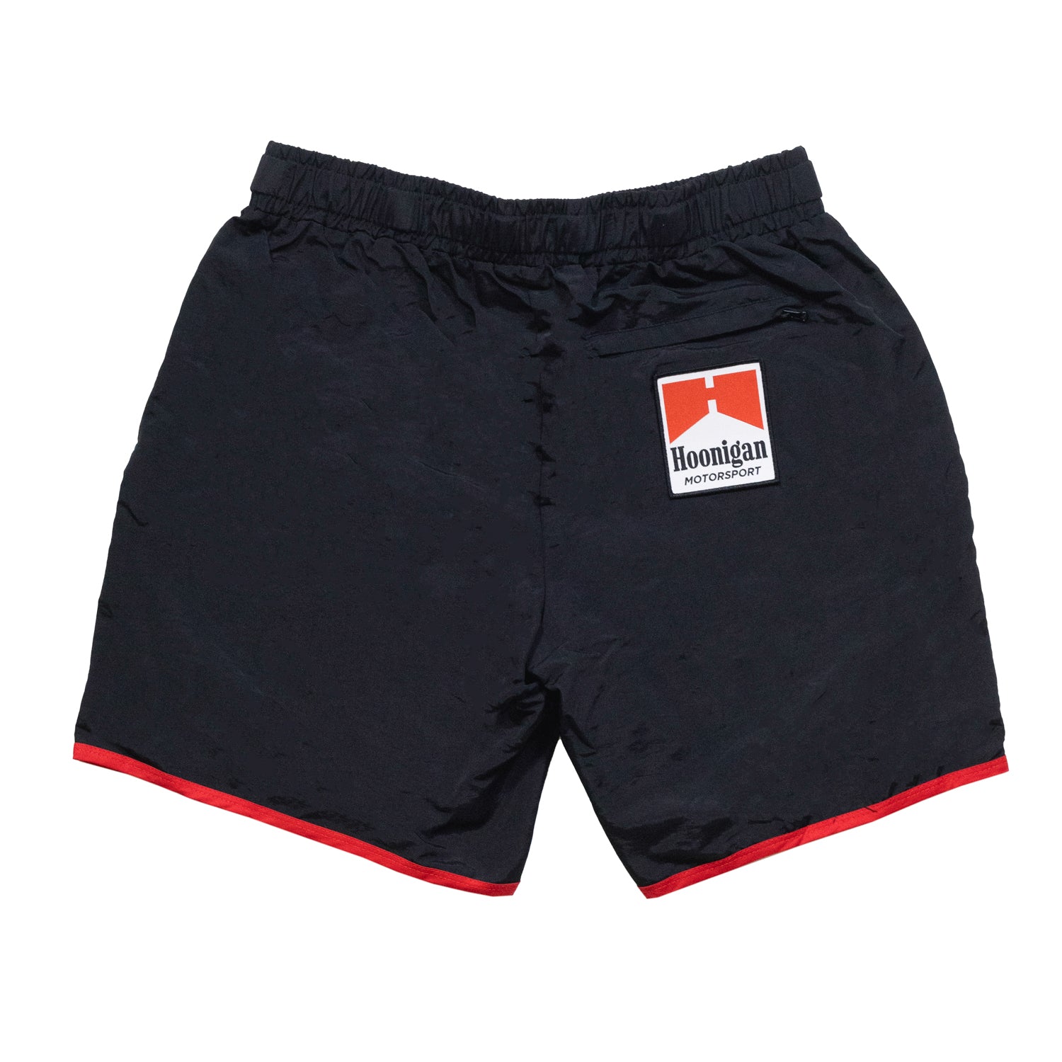 Hoonigan SURGEON GENERAL Nylon Shorts in black, featuring a logo patch on the left thigh and adjustable drawstring waist.