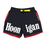 Hoonigan SURGEON GENERAL Nylon Shorts in black with white logo on the left leg. Features a drawstring waist and side pockets, designed for comfort and style.
