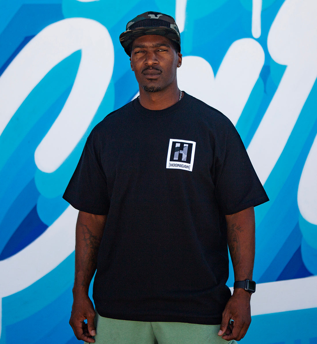 Hoonigan KILL ALL TIRES CAMO Short Sleeve Tee in black with a camo graphic print on the front.