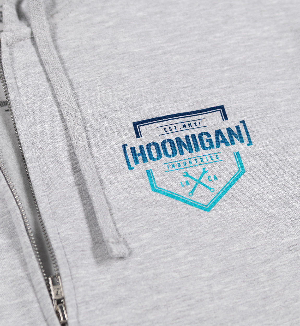 Black Hoonigan BRACKET X LOGO zip hoodie featuring a white logo on the chest and contrasting gray sleeves.