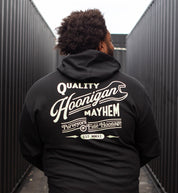 Hoonigan BACKDATE pullover hoodie in black, featuring a graphic logo design on the back and a comfortable fit.