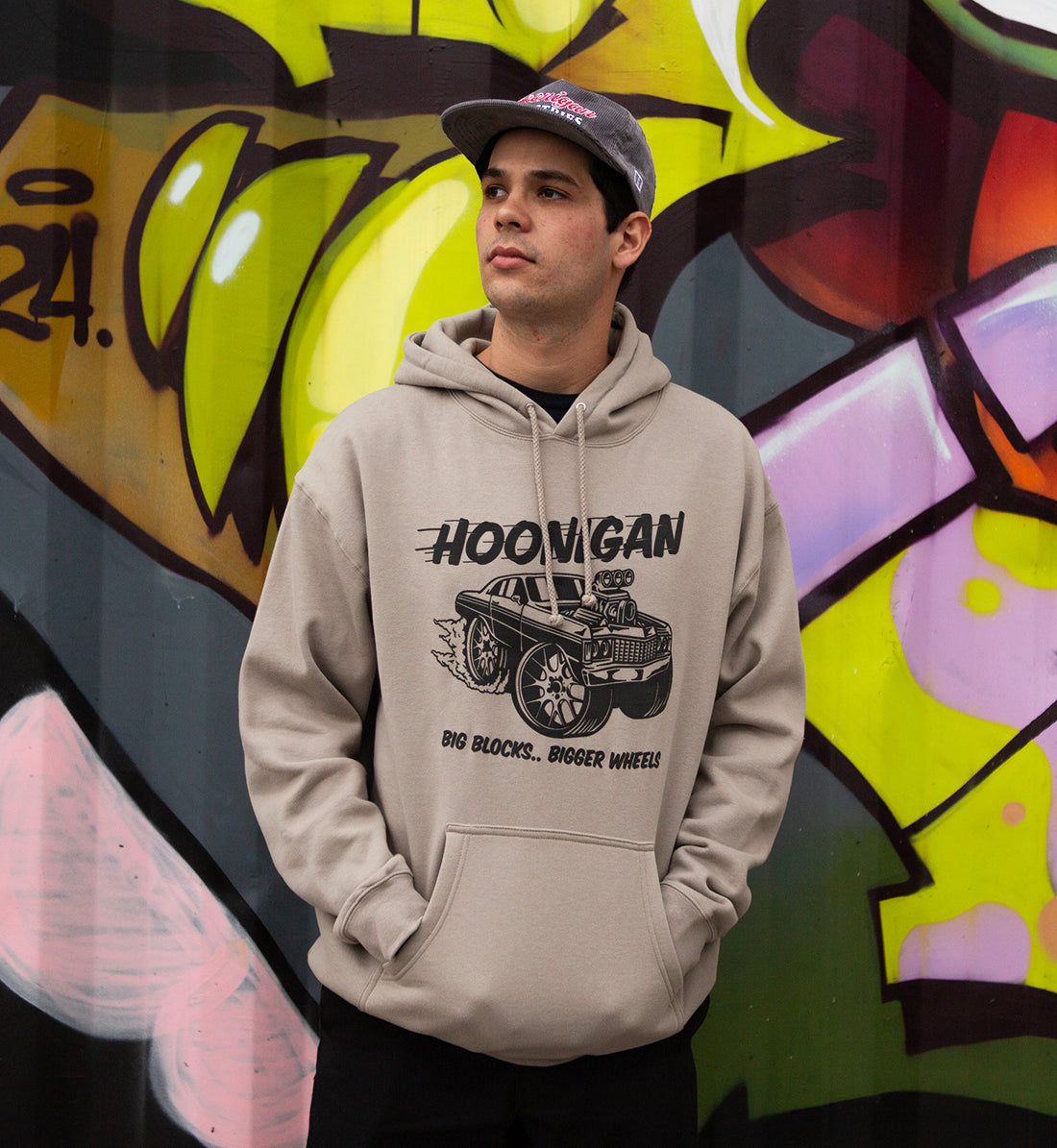 Hoonigan RIDONKULOUS pullover hoodie in black with bold white graphic text on the front, displayed in a lifestyle setting.