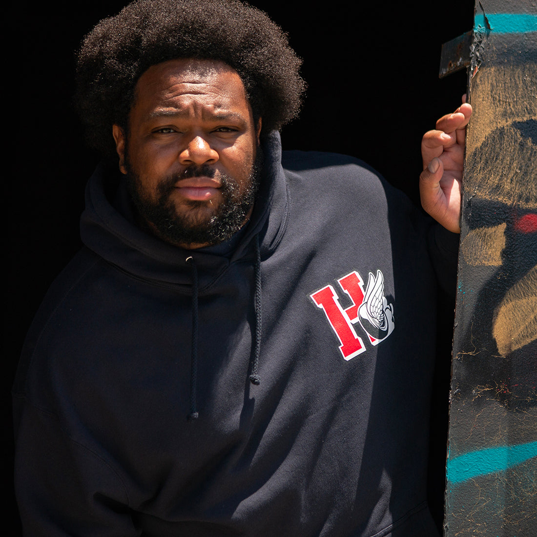 Hoonigan DROP OUT pullover hoodie in navy blue, featuring a front graphic logo and a casual, relaxed fit.