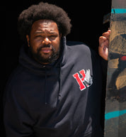 Hoonigan DROP OUT pullover hoodie in navy blue, featuring a front graphic logo and a casual, relaxed fit.