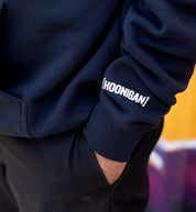 Hoonigan DROP OUT pullover hoodie in navy, featuring ribbed cuffs and a classic fit.