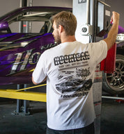 Hoonigan USED CARS Short Sleeve Tee in white, featuring a lifestyle image showing the back design.