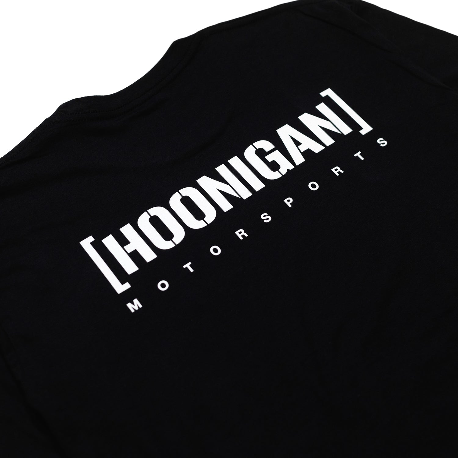 Hoonigan Motorsports Long Sleeve Tee featuring a bold graphic design on the back, black fabric with white detailing.