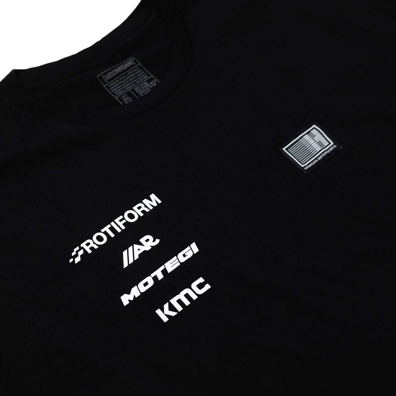 Hoonigan Motorsports long sleeve tee featuring a front graphic design in black and white.