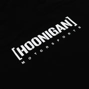 Black Hoonigan Motorsports pullover hoodie featuring a large logo graphic on the back and a front kangaroo pocket.