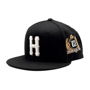 Hoonigan NATIONAL SMASHTIME Snapback Hat featuring a black and yellow design with bold lettering and an adjustable snapback closure.