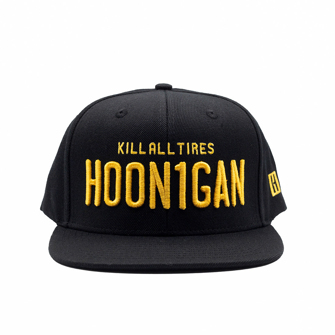 Hoonigan Vintage Plates Snapback Hat in black featuring a bold white logo and adjustable snap closure.