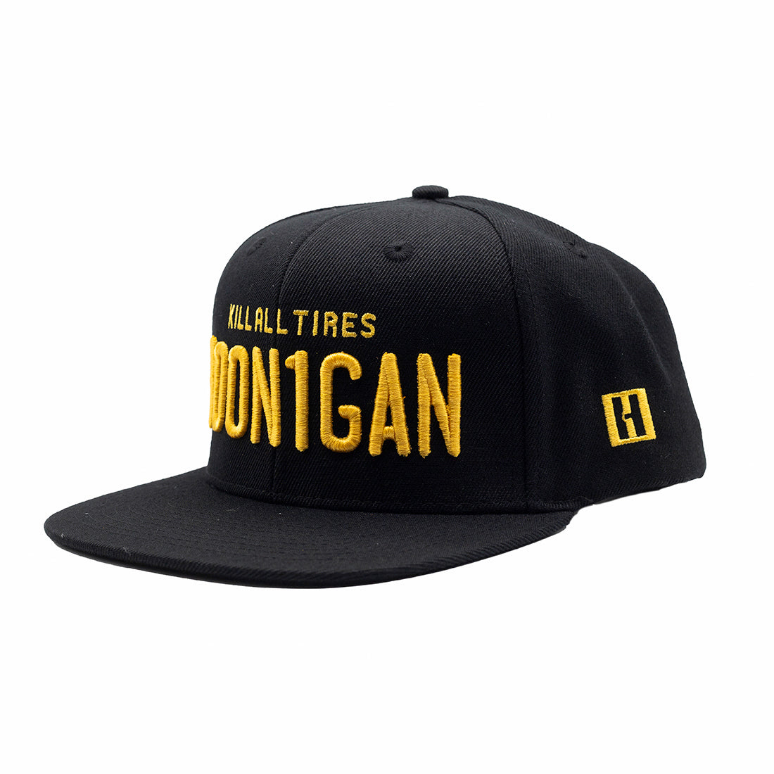 Hoonigan Vintage Plates Snapback Hat featuring a black base with colorful vintage-inspired plate graphics and an adjustable snapback closure.