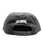 Hoonigan TIRE SLAYER unstructured snapback cap featuring a black fabric with white embroidered logo.