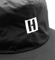 Hoonigan TIRE SLAYER unstructured snapback cap with black body and embroidered logo on the front.
